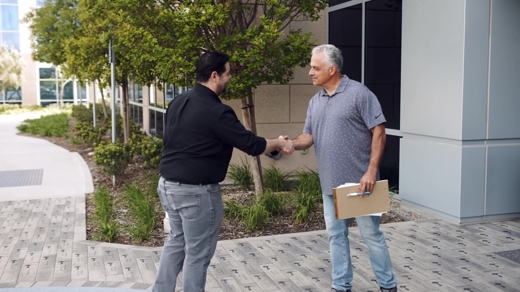 dan greeting a client
