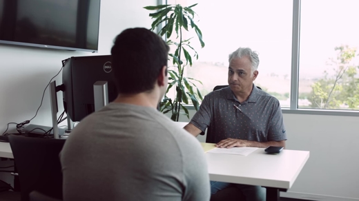 dan talking with client